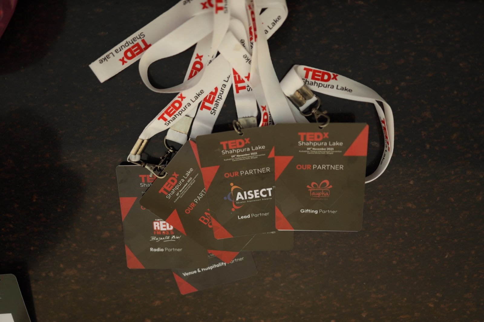 TEDxShahpura Lake attendee badges and lanyards