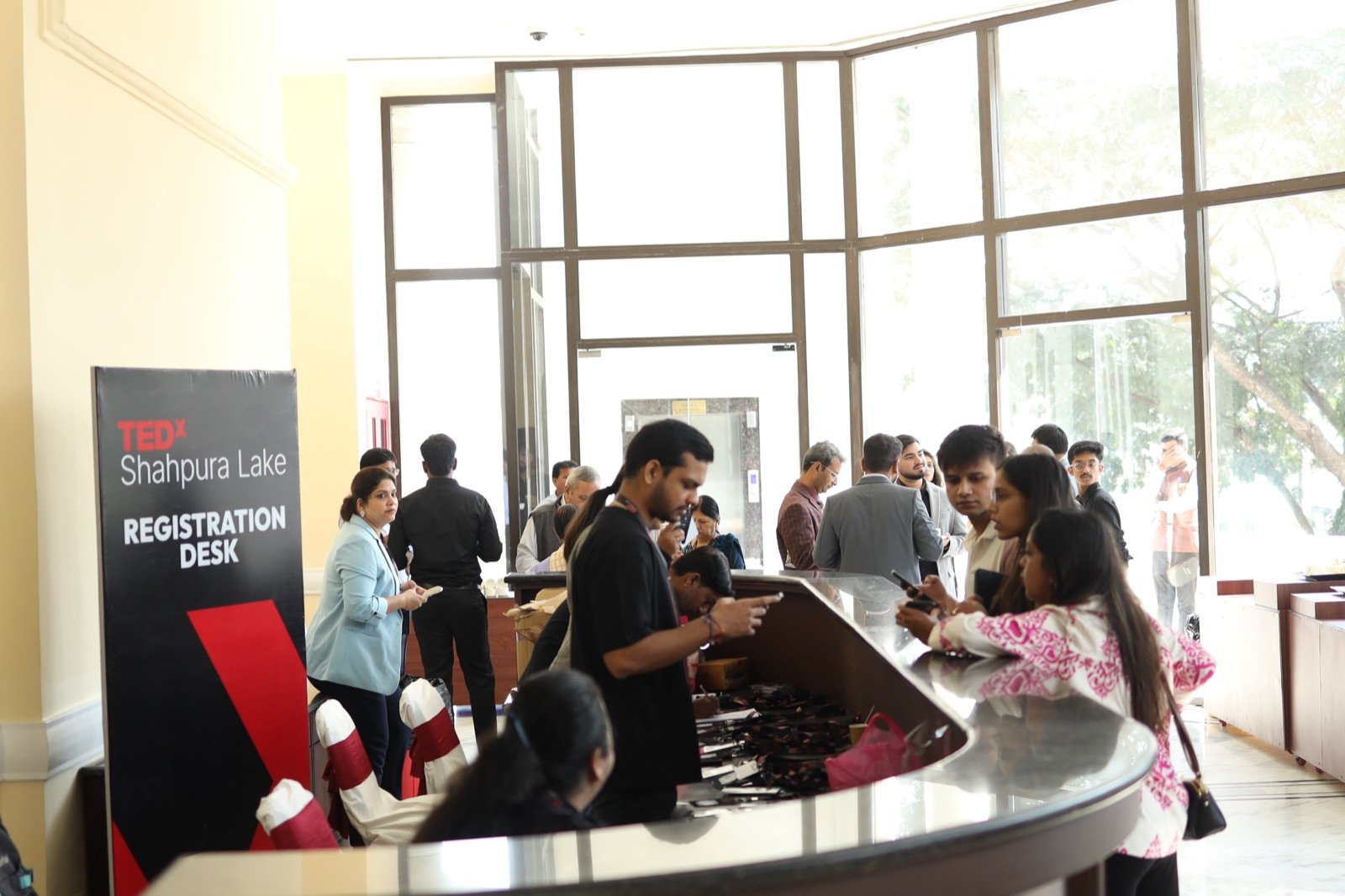 Attendees at the registration desk