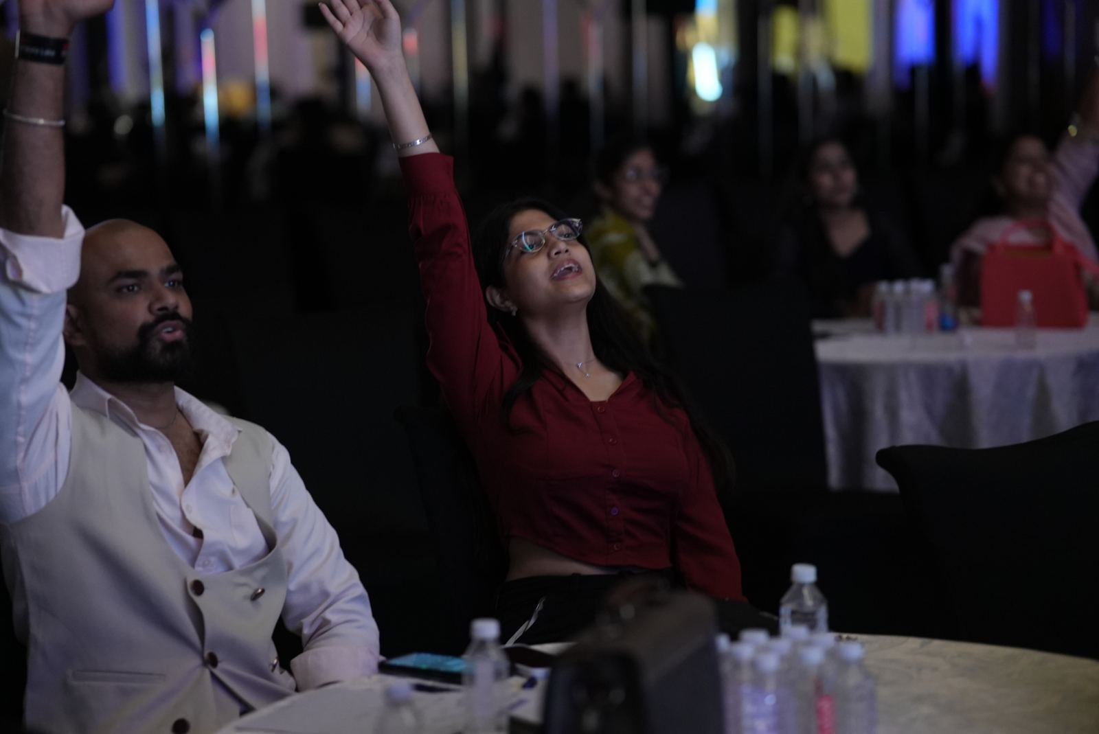 Audience members reacting during a talk