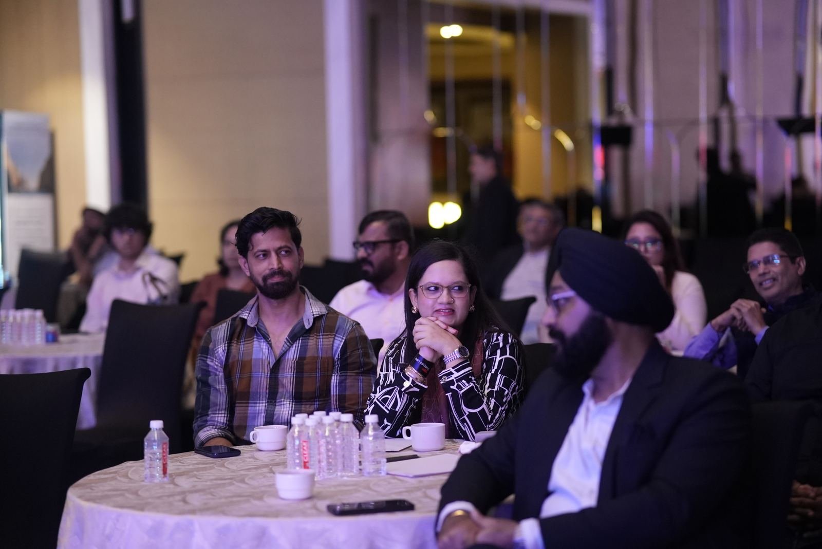 The audience listening intently during a talk