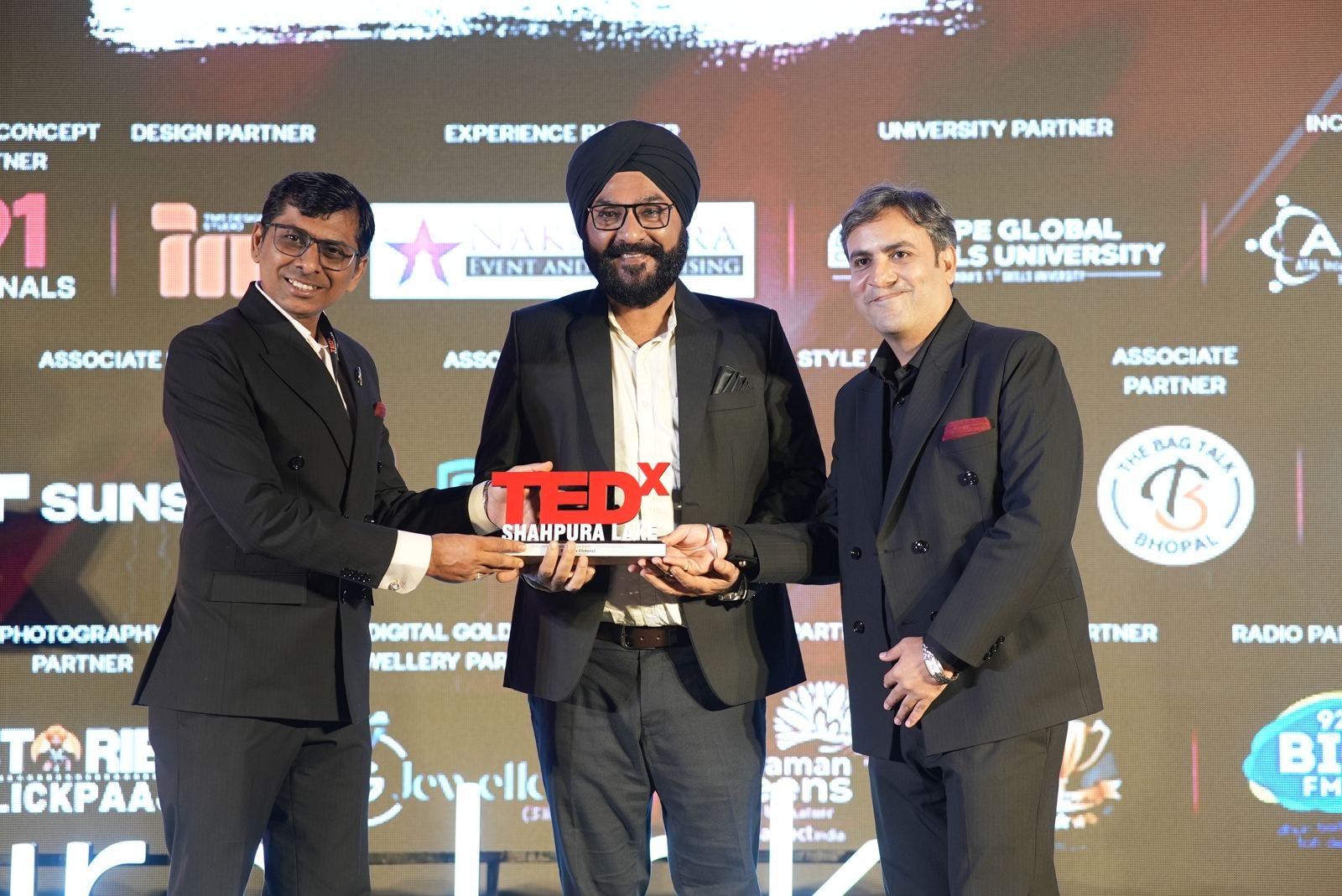 Partners being felicitated on stage
