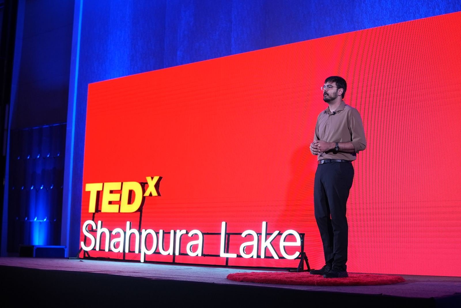 Speaker delivering a talk at TEDxShahpura Lake 2026